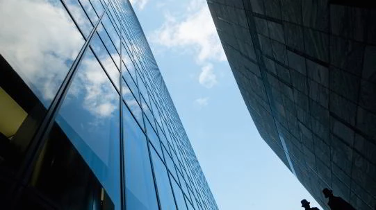 Tall building from low angle with blue sky